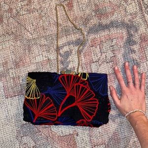 Shanghai tang designer clutch with jade close